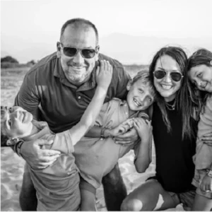 Karen and her family smiling